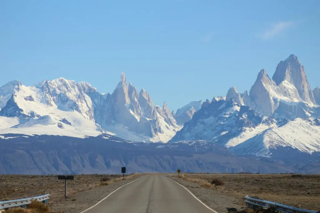 Snow covered mountains under the blue sky